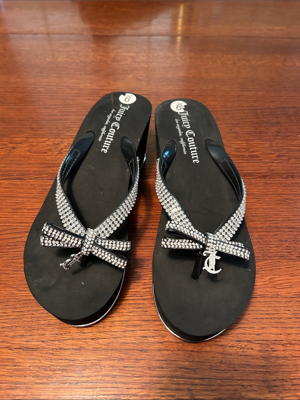Juicy Couture Black Flip Flops with Crystal Bow Accents